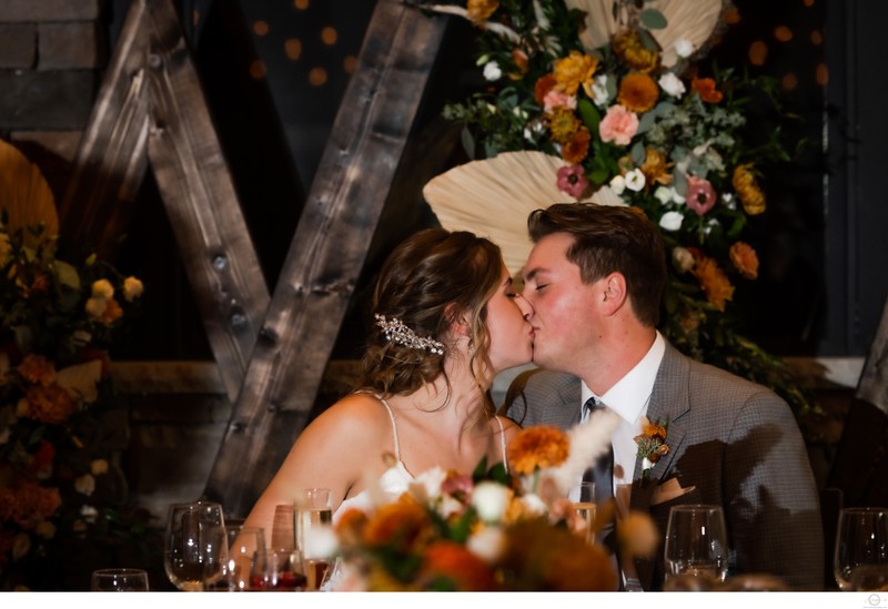 Kiss at Head Table:  Craigleith Wedding Photographer