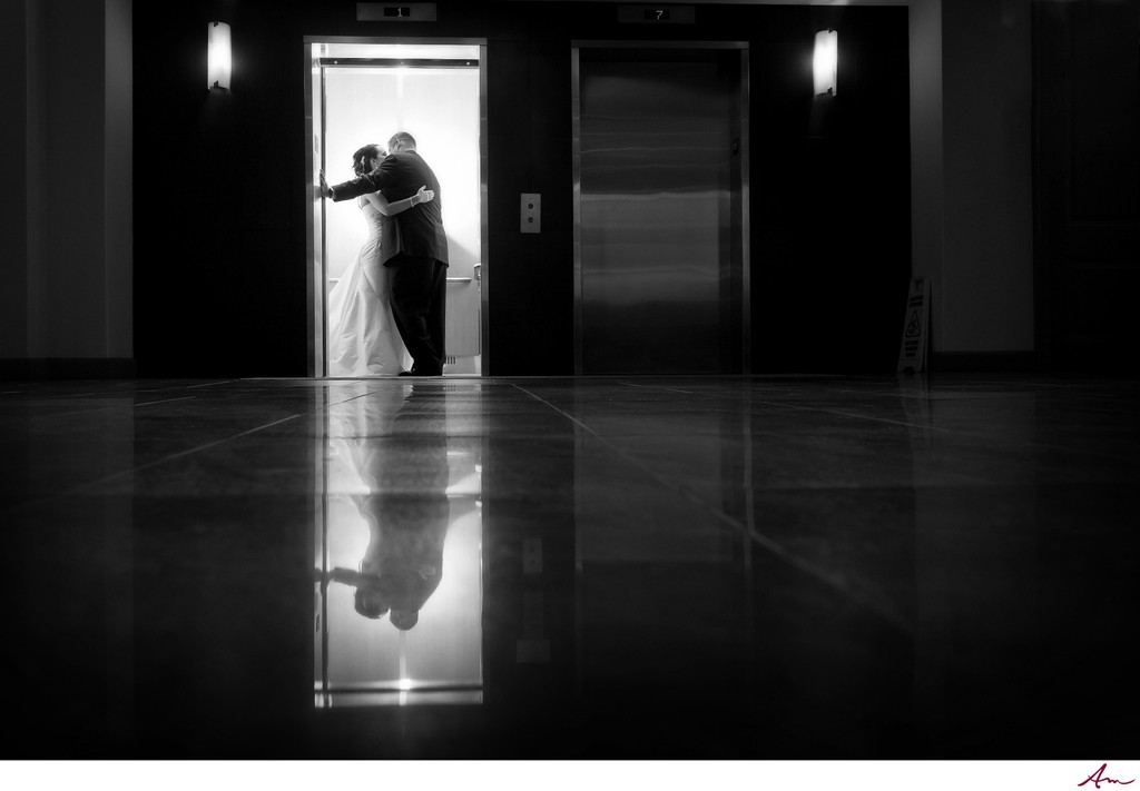 Halifax Bride and Groom kissing in elevator