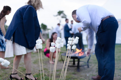 Toasting Marshmallows At Seacoast Science Center Wedding