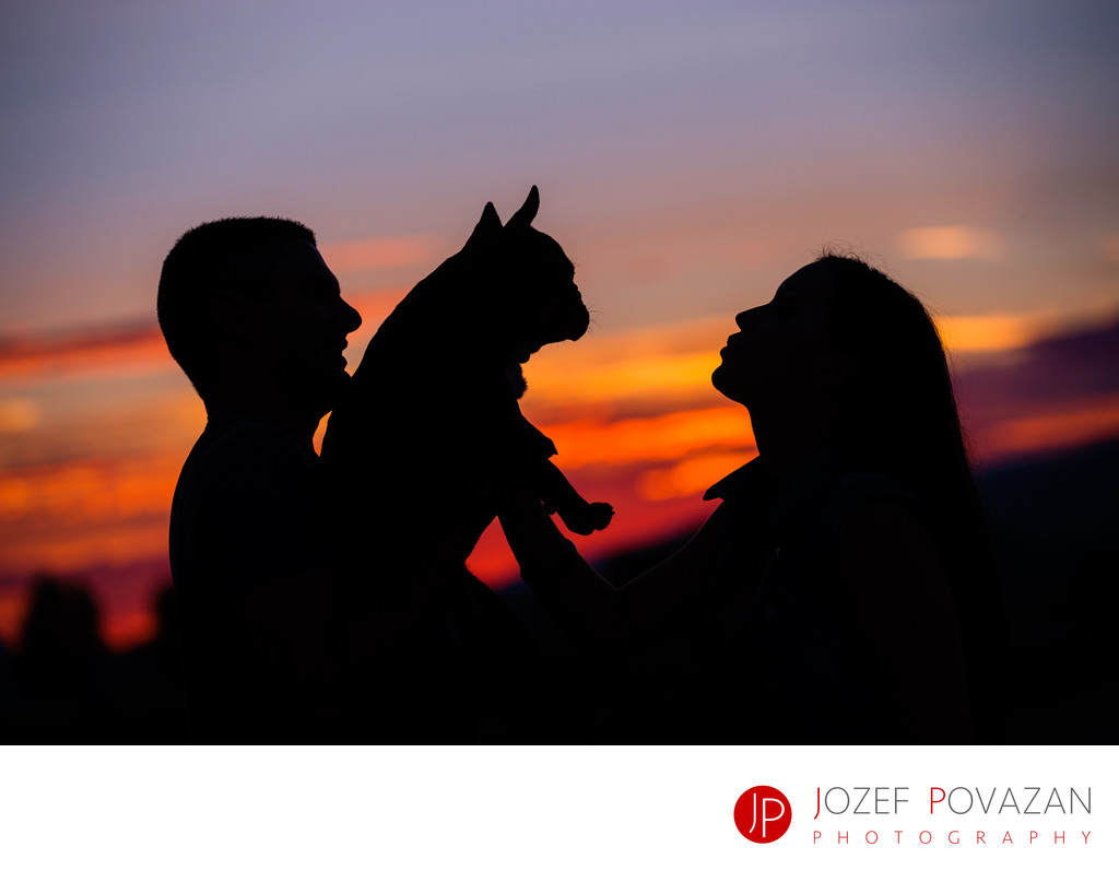 Bride, groom and puppy silhouette at pre wedding shoot