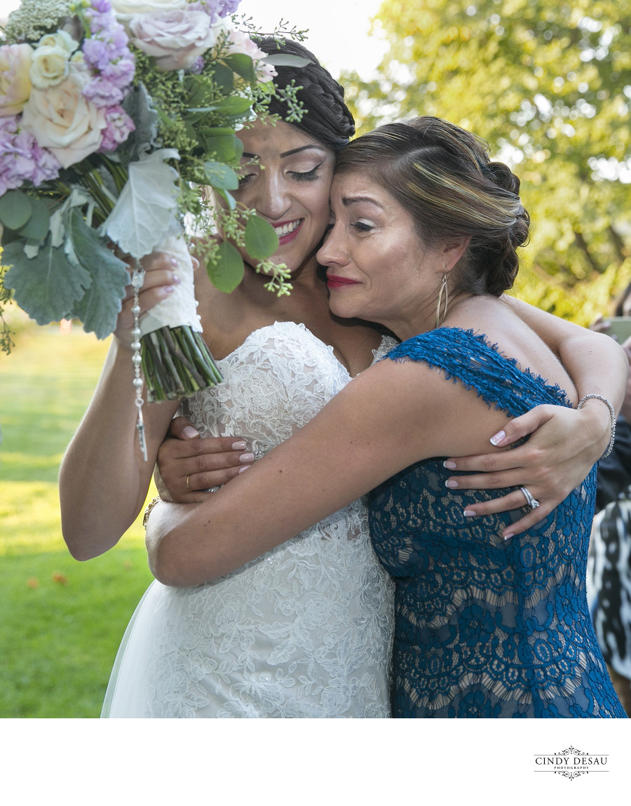 Emotional Mom Hugs Bride at Crossing Vineyards