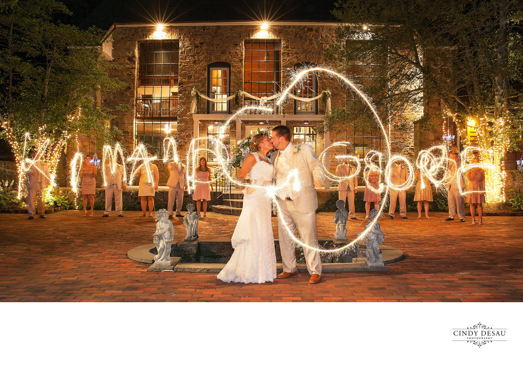 Bridal Party Spells Names of Bride and Groom with Sparklers in Bucks County

