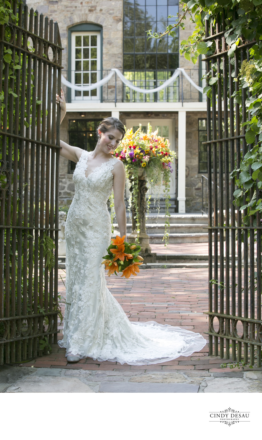 Bride at the Courtyard Gates of Holly Hedge