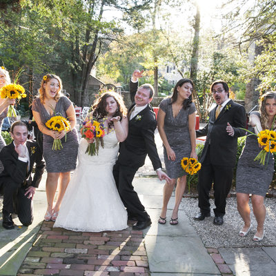 Fun Bridal Party Pose in New Hope with Sunflowers