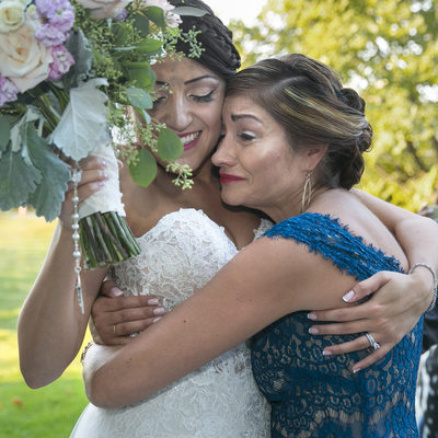 Emotional Mom Hugs Bride at Crossing Vineyards