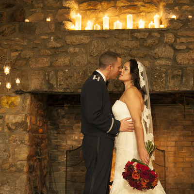 Candlelight Ceremony Kiss Wedding Photo