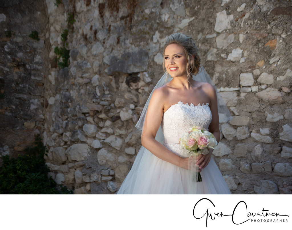Beautifully lit Bride in Malcesine Castle