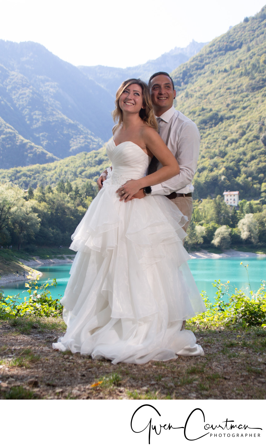 Trash the dress in Lake Tenno, Italy.