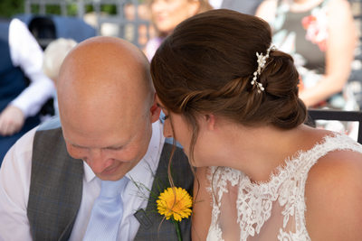 Intimate moment during the wedding in Malcesine Castle.