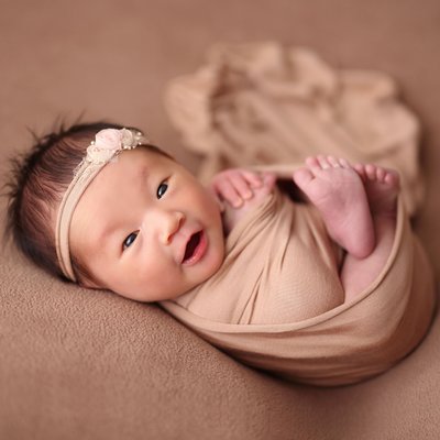 Asian newborn baby girl studio portrait