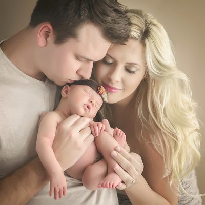 newborn photo with mom and dad