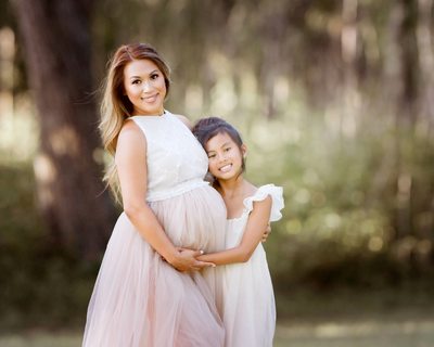 Mother and daughter maternity photo
