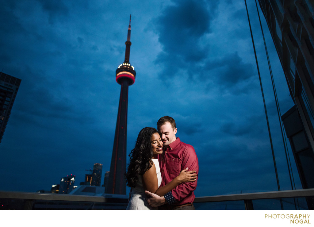 Embrace On A Rooftop by the CN Tower