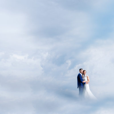 Bride and Groom in the clouds