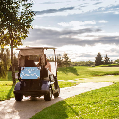 Wedding Couple in Golf Cart at Nobleton Lakes Golf Club