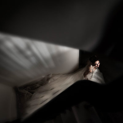 Bride Walking Down Stairs After Getting Ready