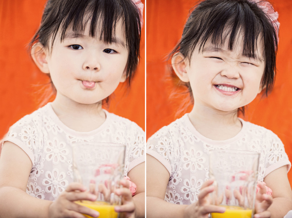 portrait-toddler-orange-juice-orange-background