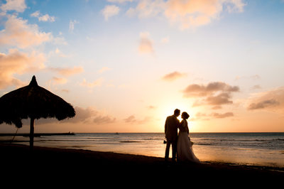 sunset bride and groom silhuette