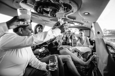 wedding party limo champagne cheers
