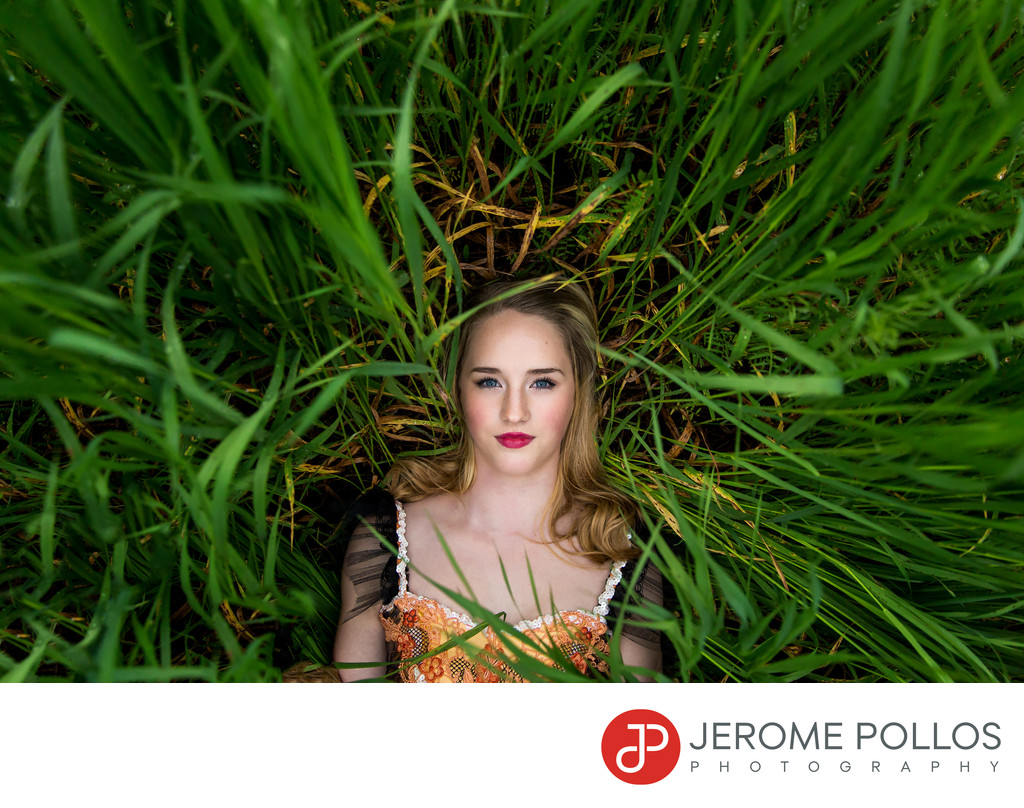 Laying In Tall Grass Senior Portrait