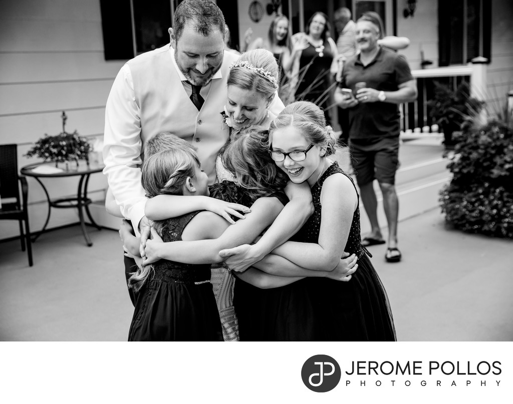 Blended Family Wedding Reception Group Hug