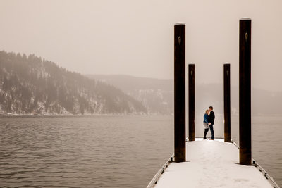 On The Snowy Dock Engagement Portrait