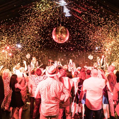 gold confetti showers guests
