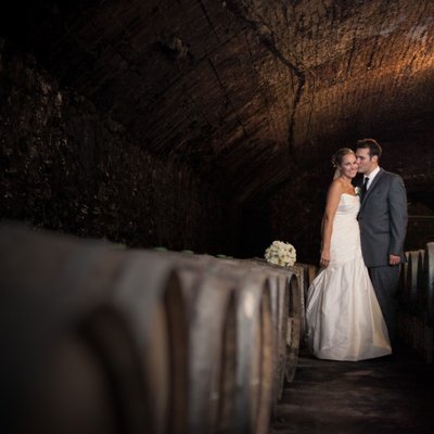 Brotherhood Winery | Bride & Groom in Wine Cellar
