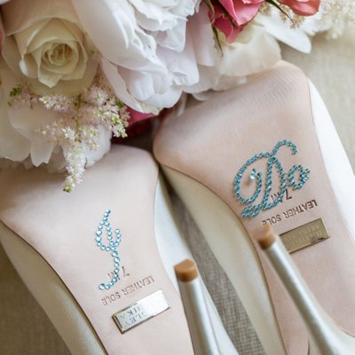 badgley mischka white wedding shoes and flowers