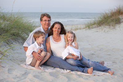 Sunset Beach family of 4 with sand dunes and ocean