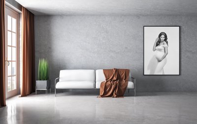 Modern living room with sofa and blank banner on wall.