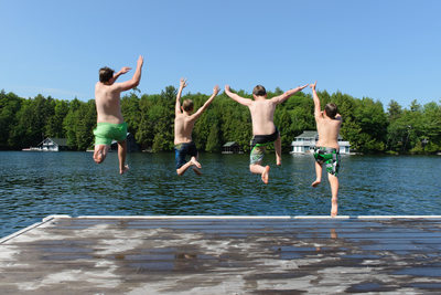 Running and Jumping Off the Dock at the Cottage
