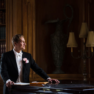 Timeless Portrait of the Groom at Oheka Castle Library