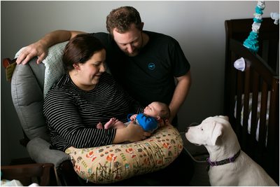 A New Member: Family  and Newborn in Home