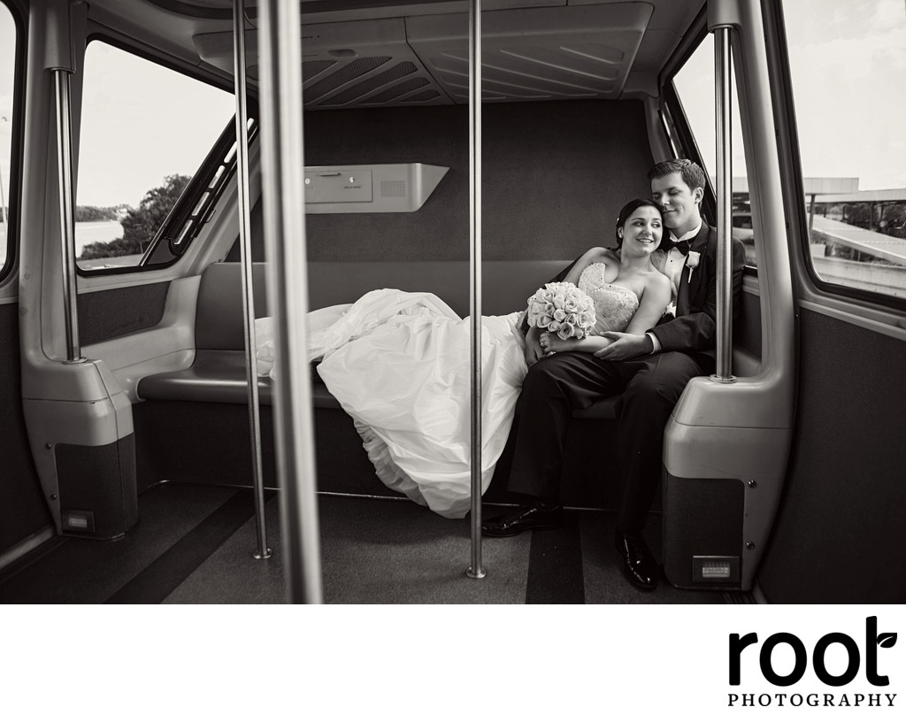 Bride and Groom Riding a Monorail