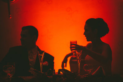 Orange Uplighting and Champagne at Fall Themed Wedding 