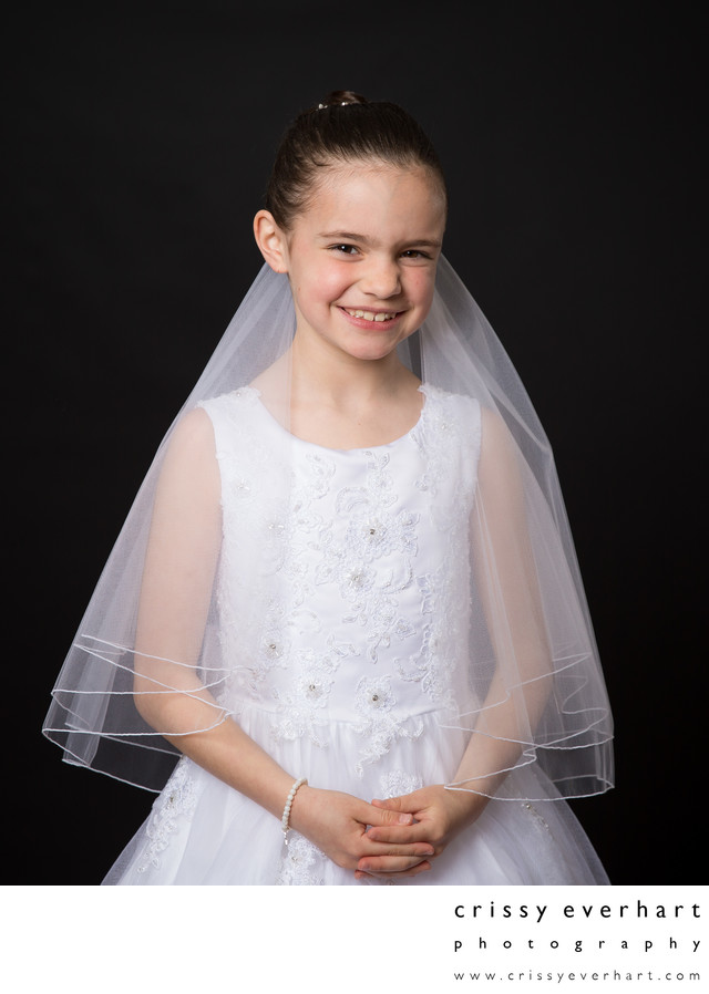First Holy Communion Photos on Black Backdrop