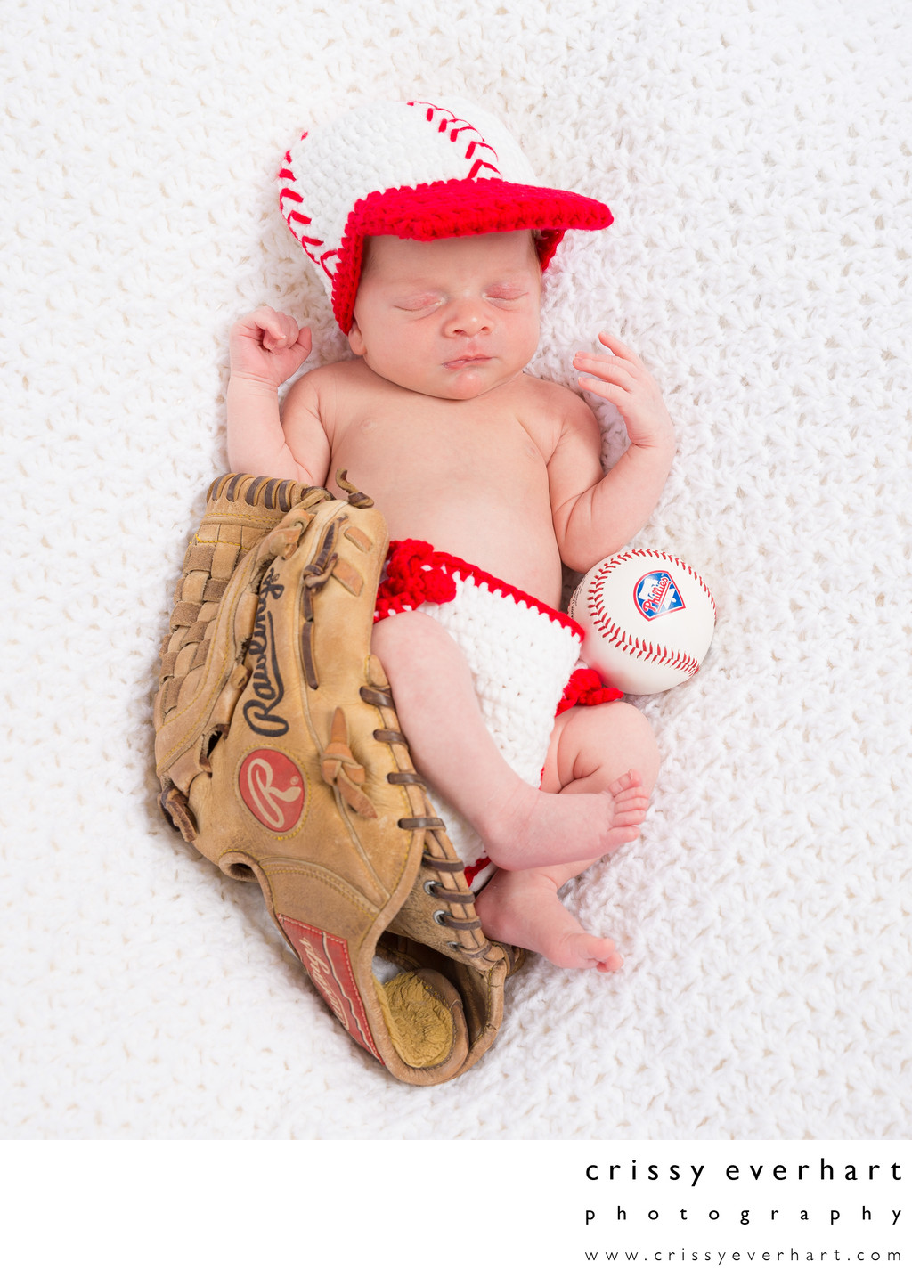 Baby in Knit Phillies Outfit with Baseball and Glove