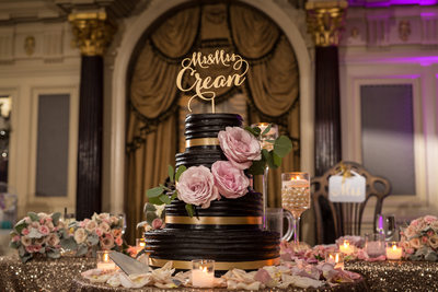 Chocolate Wedding Cake with Pink Roses and Gold Glitter