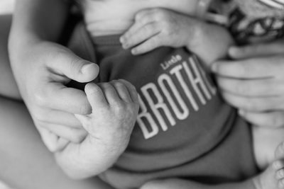 Closeup Baby and Brother Hands