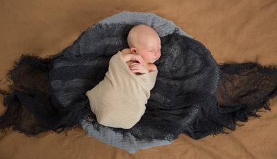Paoli Newborn Photographer - Boy on Brown and Blue