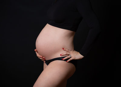 Artistic Maternity Photos in Studio - Pregnant Belly