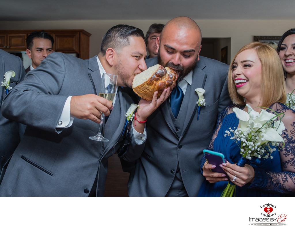 Romanian orthodox wedding traditions, braking and catching of the traditional bridal cake (sweet bread).