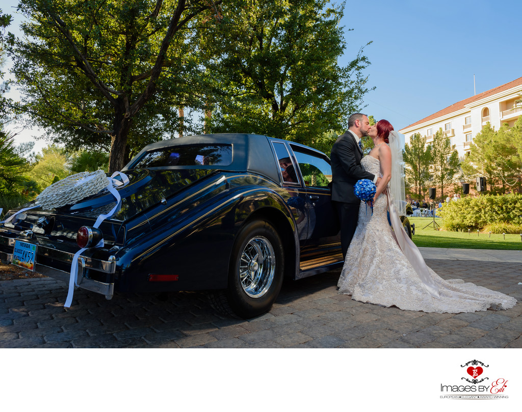 JW Marriott Las Vegas wedding Photo of the couple in front of an old car