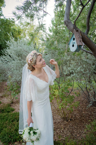 Springs Preserve bride is checking the bird feeder