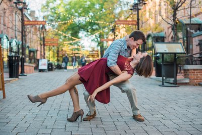 Engaged Couple Dancing at Brightleaf Square in Durham