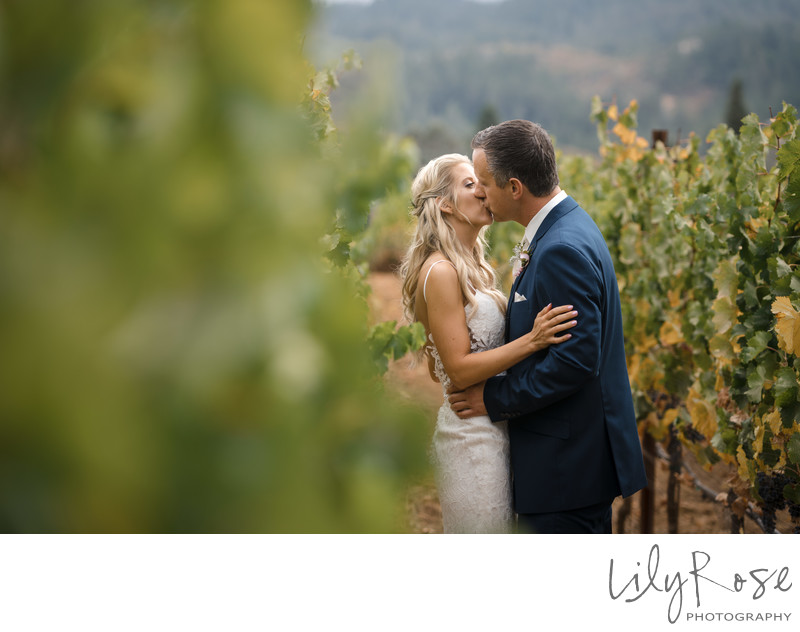 Wedding Couple in Vineyard at Ledson Winery