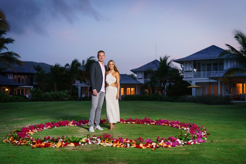 Couple in bougainvillea heart dusk Half Moon Jamaica Couple in bougainvillea heart dusk Half Moon Jamaica
