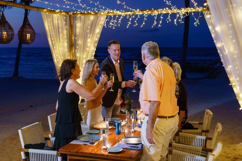 Family champagne toast Half Moon beach Jamaica Family champagne toast Half Moon beach Jamaica