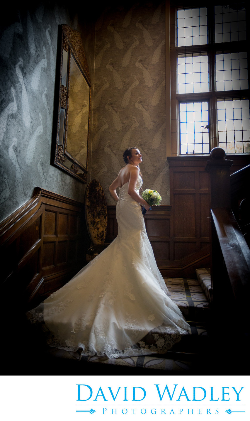 The stunning staircase at Moxhull Hall with the bride on her Wedding Day.